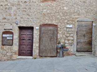Exploring doors of Capalbio.