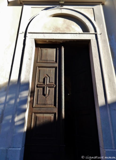 The door of St. Martin Church in Šmartno. From the outside...