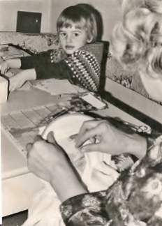 Pre-school. Busy playing with grandma's postcards. Photo: BM